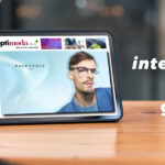 Mockup blank white screen portable tablet on wooden table with c